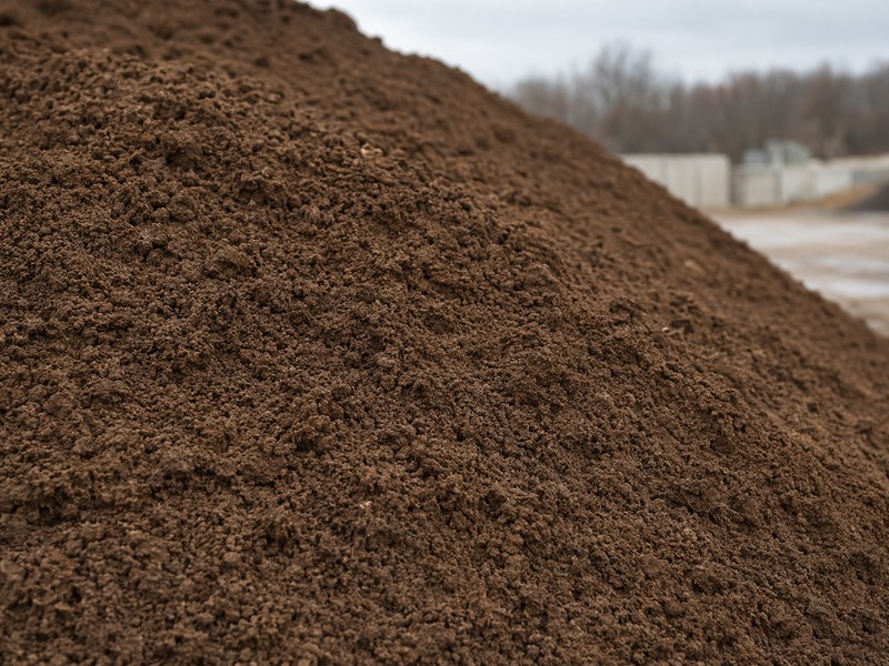 Clean fill dirt stockpile for site grading