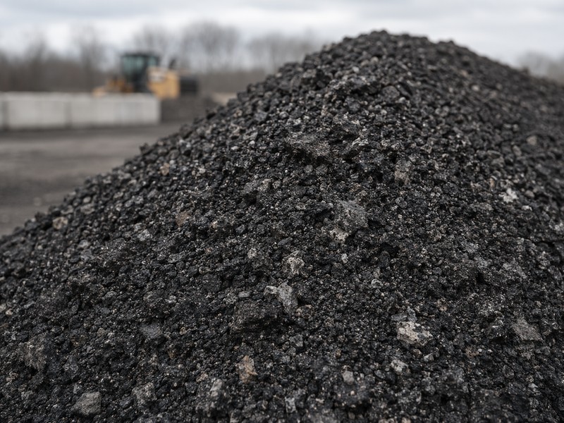 Reclaimed asphalt pavement stockpile awaiting reprocessing